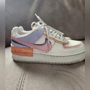 Women's Nike Air Force 1 Shadow multicolor sneakers.
